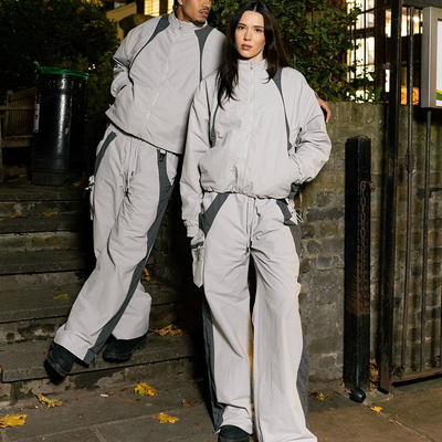 কেনা হেভিওয়েট ১০০% পলিয়েস্টার জগিং স্যুট প্যাচওয়ার্ক XXS-5XL কাস্টম উইন্ডব্রেকার সেট অনলাইনে উৎপাদন