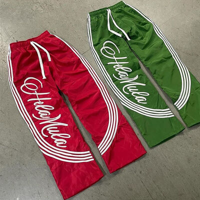 kupować Nylon Windbreaker Side Stripes Sweatpants Lightweight Baggy Wide Leg Jogger Silk Screen Printing Men Quick Dry Track Pantalony produkcja online