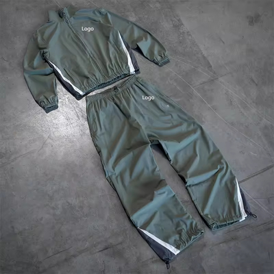 Ein guter Preis. Bekleidungshersteller Kundenspezifische leere Activewear Windjacke Stickerei Logo Reißverschluss Jacke Baggy Sweatpants Trainingsanzug für Herren Online