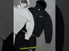 Ensemble de survêtement décontracté avec sweat à capuche zippé coupe ample broderie logo et pantalon de jogging ample.